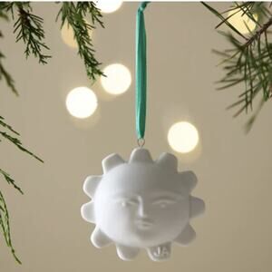 New in Box Jonathan Adler White Porcelain Sun Ornament. Two Faces!